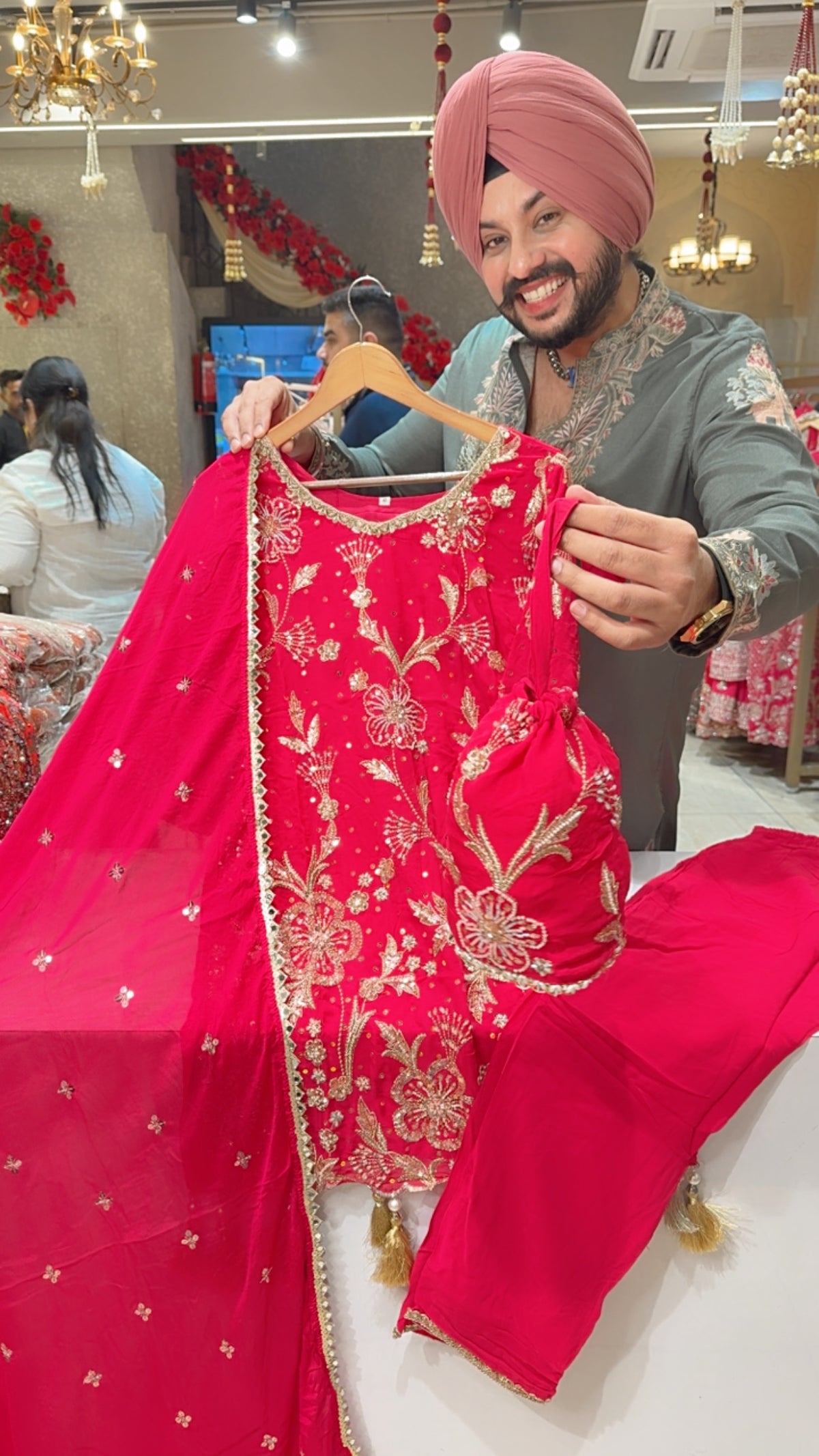 Rani Pink Georgette Heavy Hand embroidered Indowestern Suit with Potli