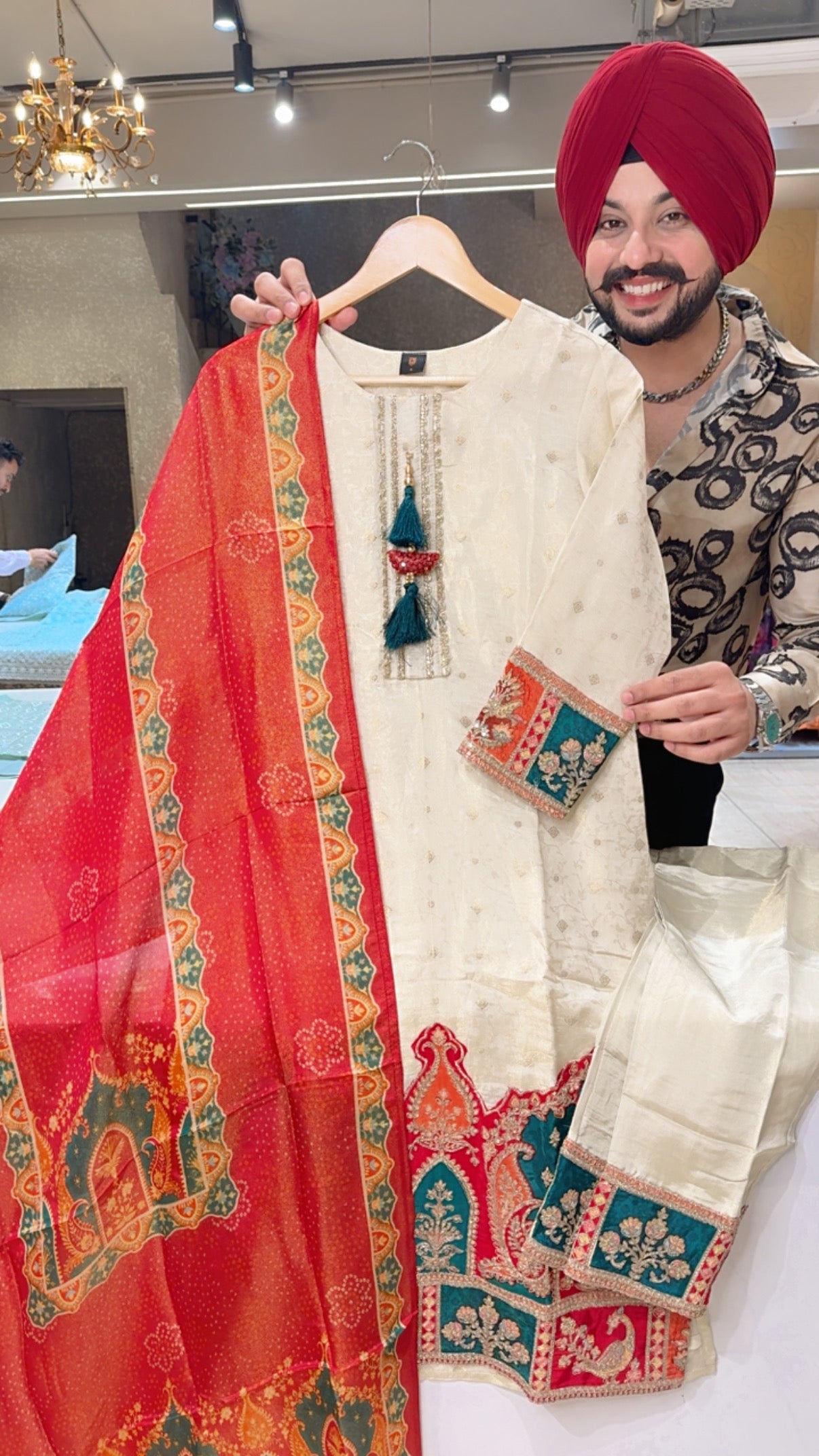 Ivory Colour Shimmer Jaquard Silk Party Wear Straight Suit with Heavy Embroidered Border