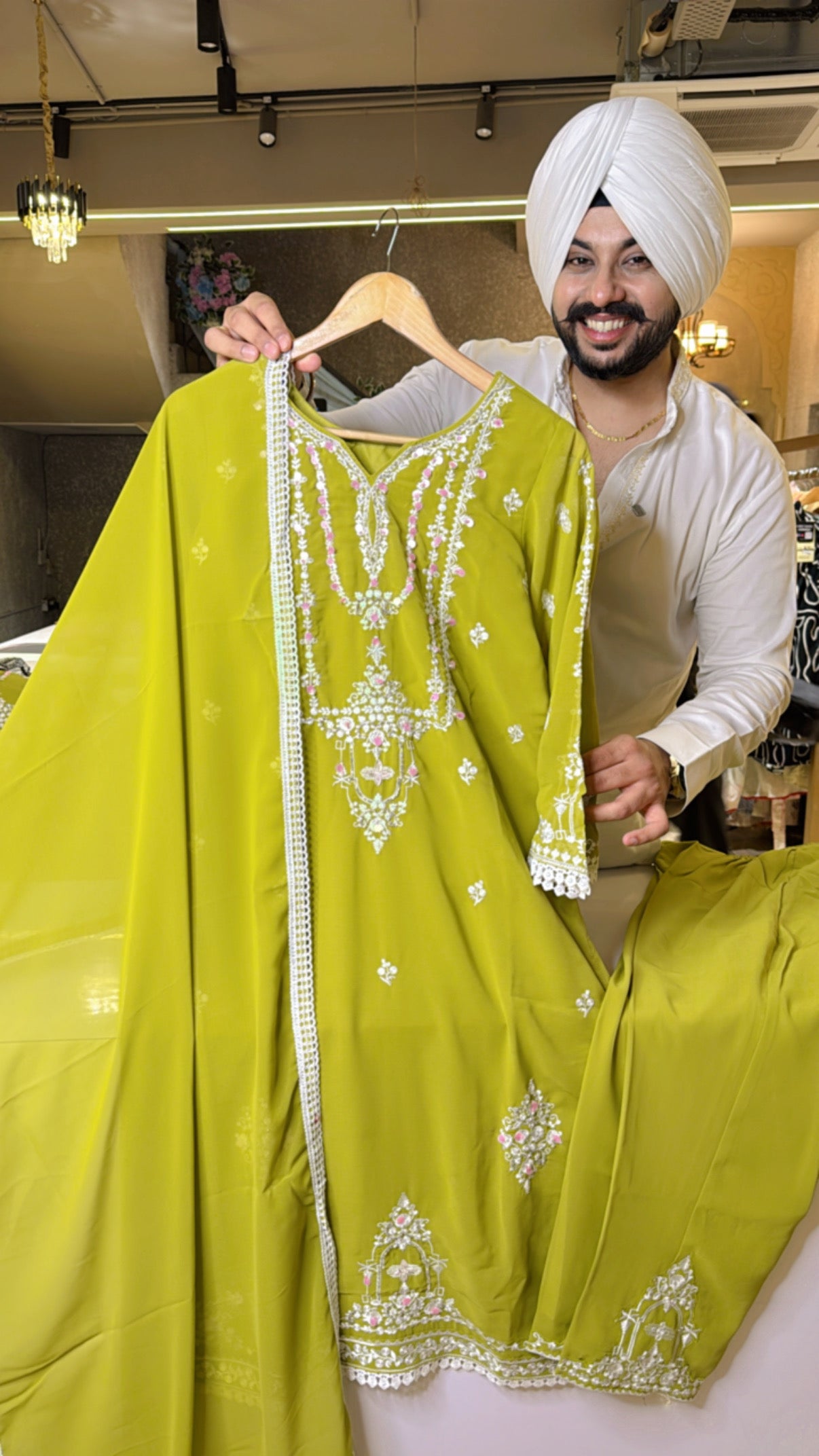 Light Parrot Georgette Heavy embroidered Kashmiri Suit with Beautiful Bell Sleeves