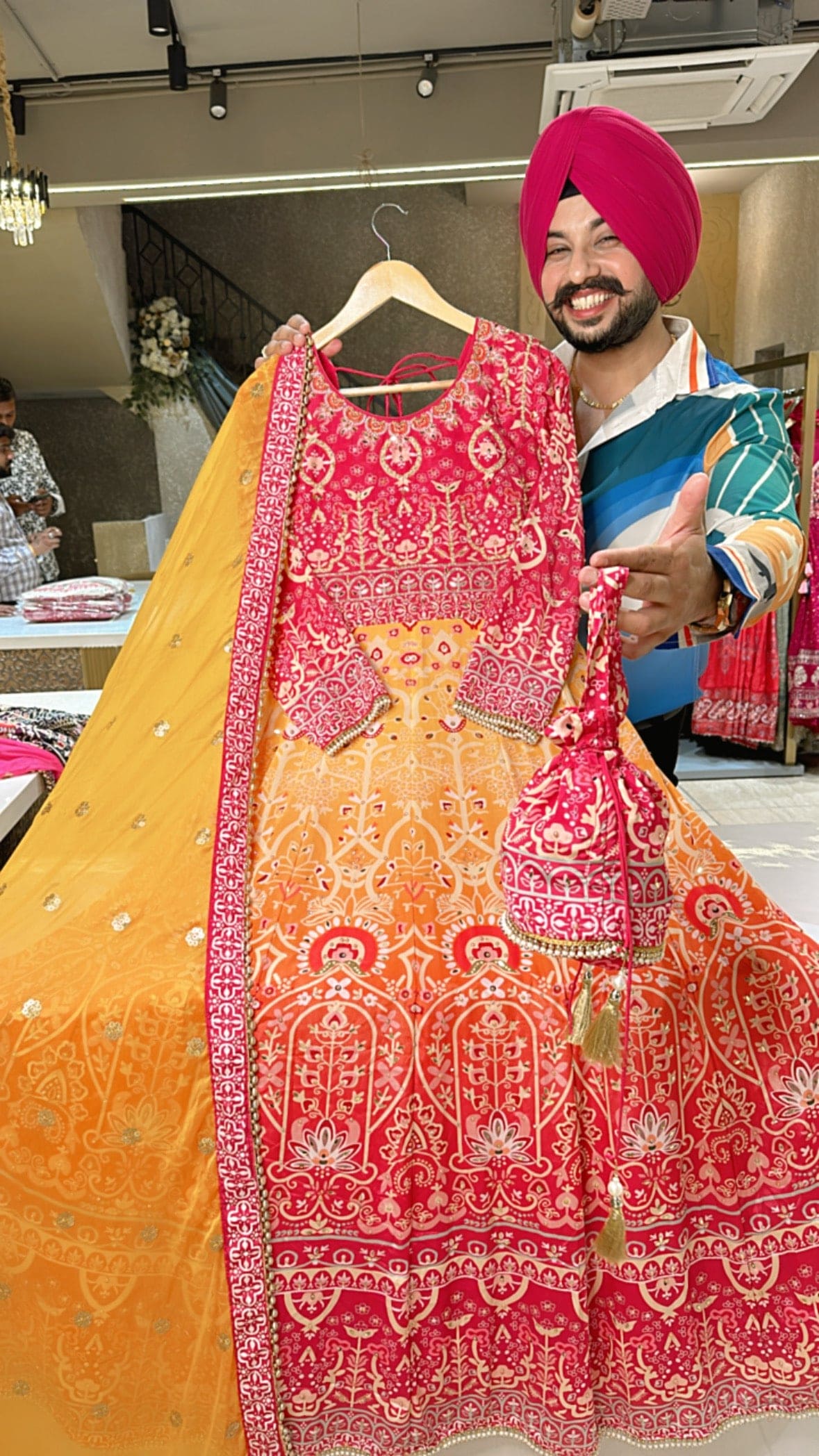 Rani pink & yellow Crepe Heavy Hand embroidered & mirror Pasting Anarkali Gown with Cute Potli