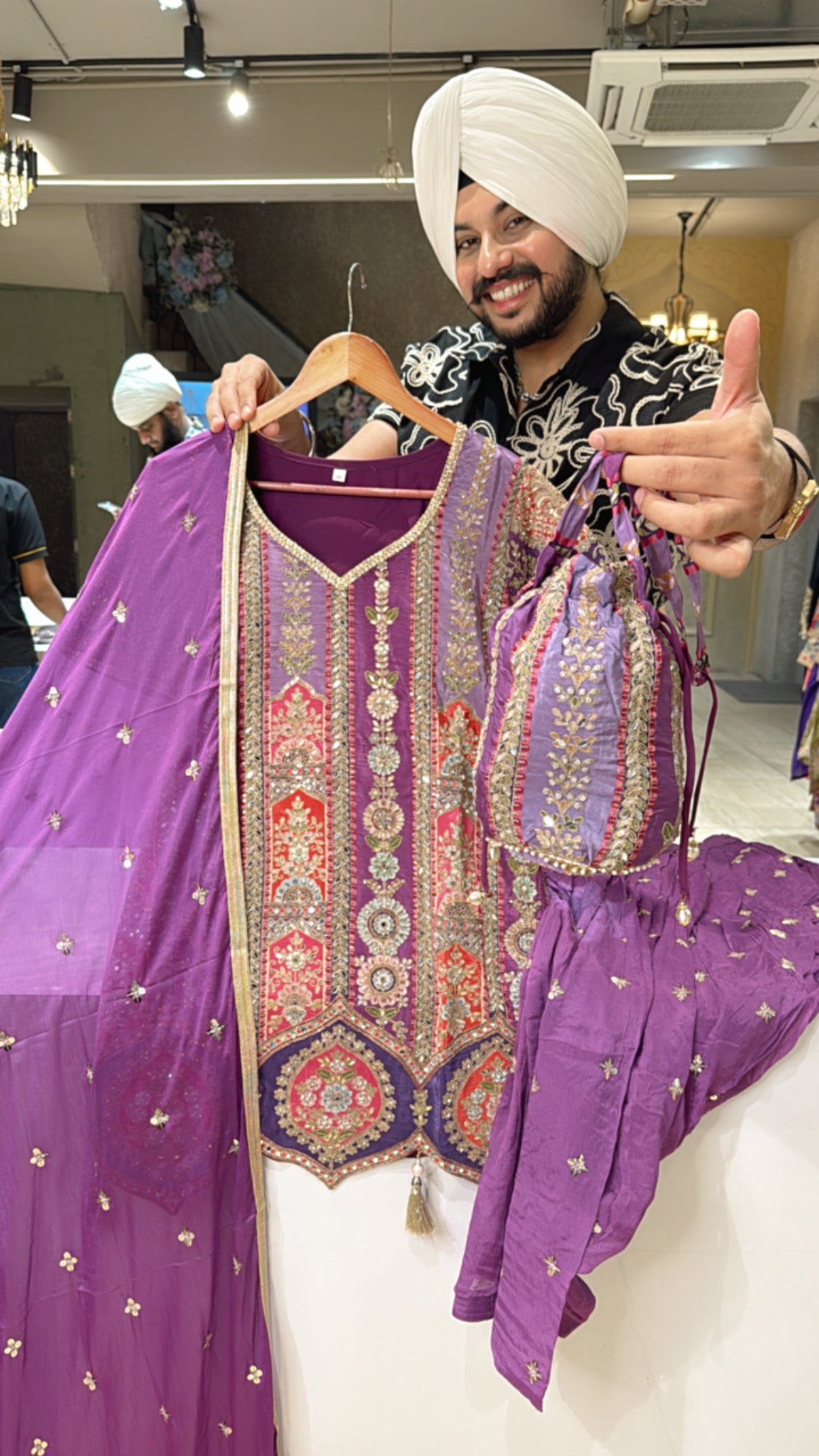 Purple Heavy Hand Embroidered Crepe Designer Salwar Suit with Beautiful Duppata & Potli