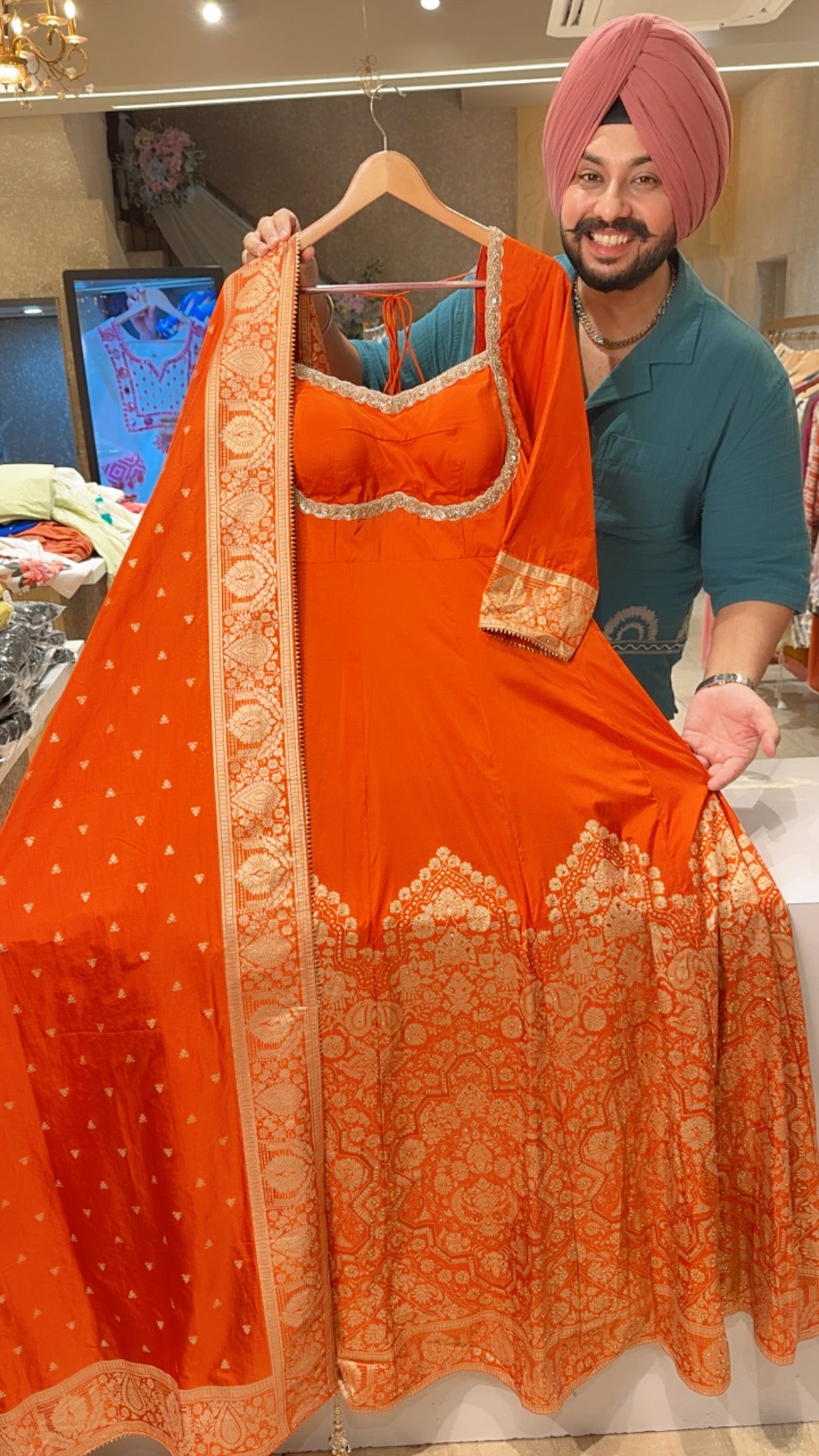 Orange Brocade Silk Hand embroidered Semi Backless Party Wear Gown