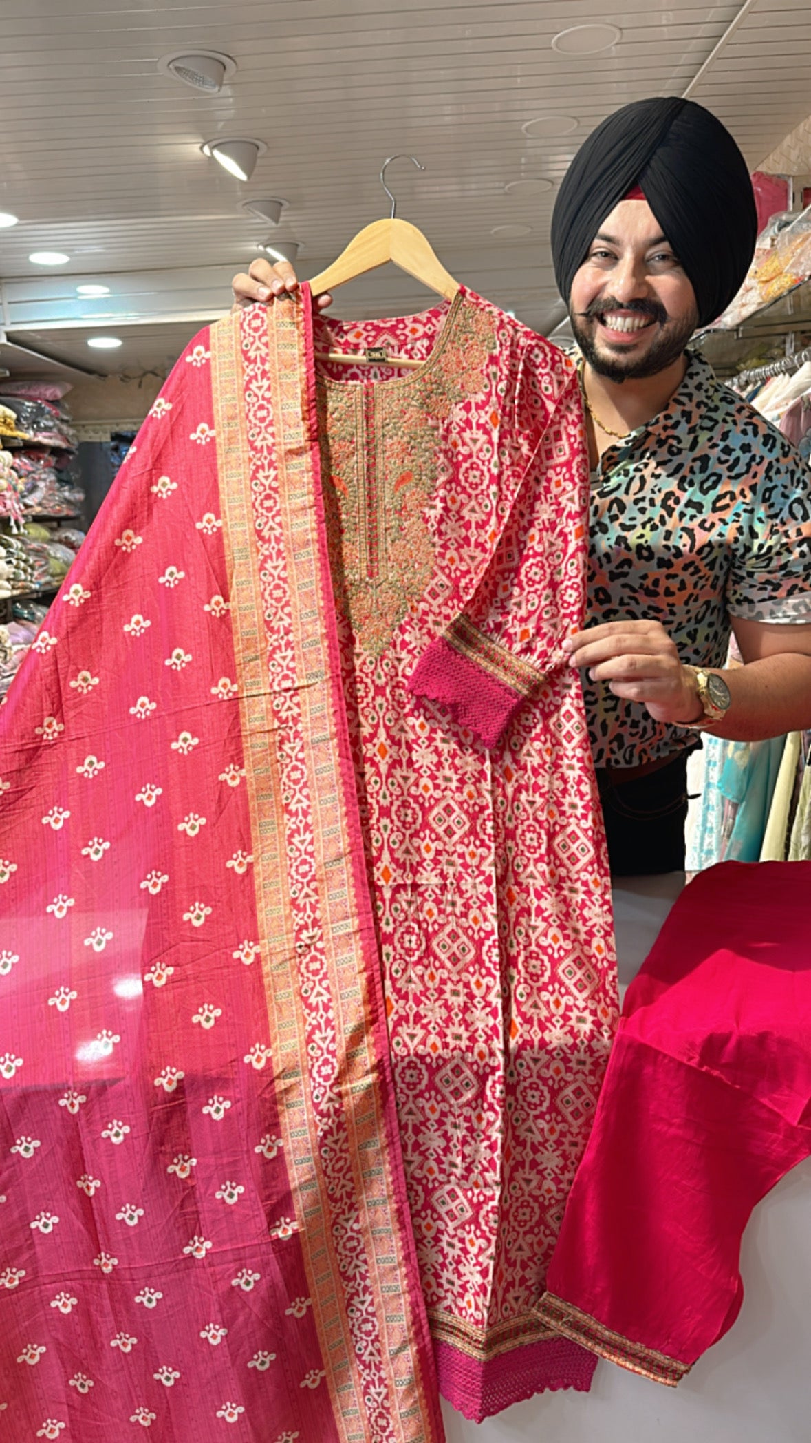 Rani Pink Muslin silk suit with Beautiful embroidery Work on neck