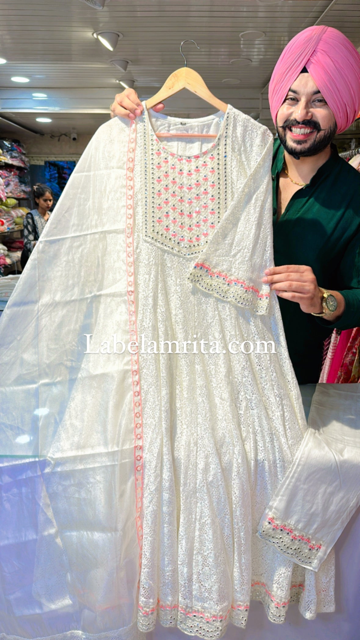 Moon White Crochet lace Pakistani Anarkali Suit with
Beautiful Embroidery work on neck