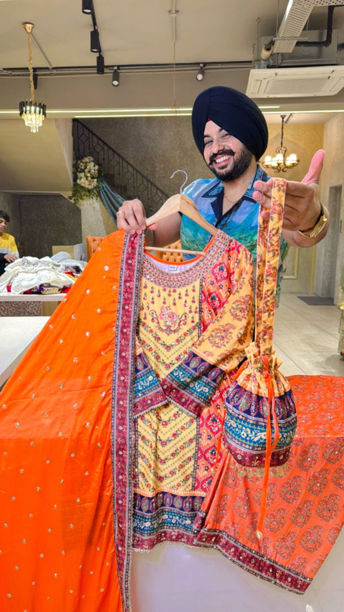 Vibrant Orange Velvet Heavy mirror Pasting Indo Western Pakistani Plazo suit with Potli