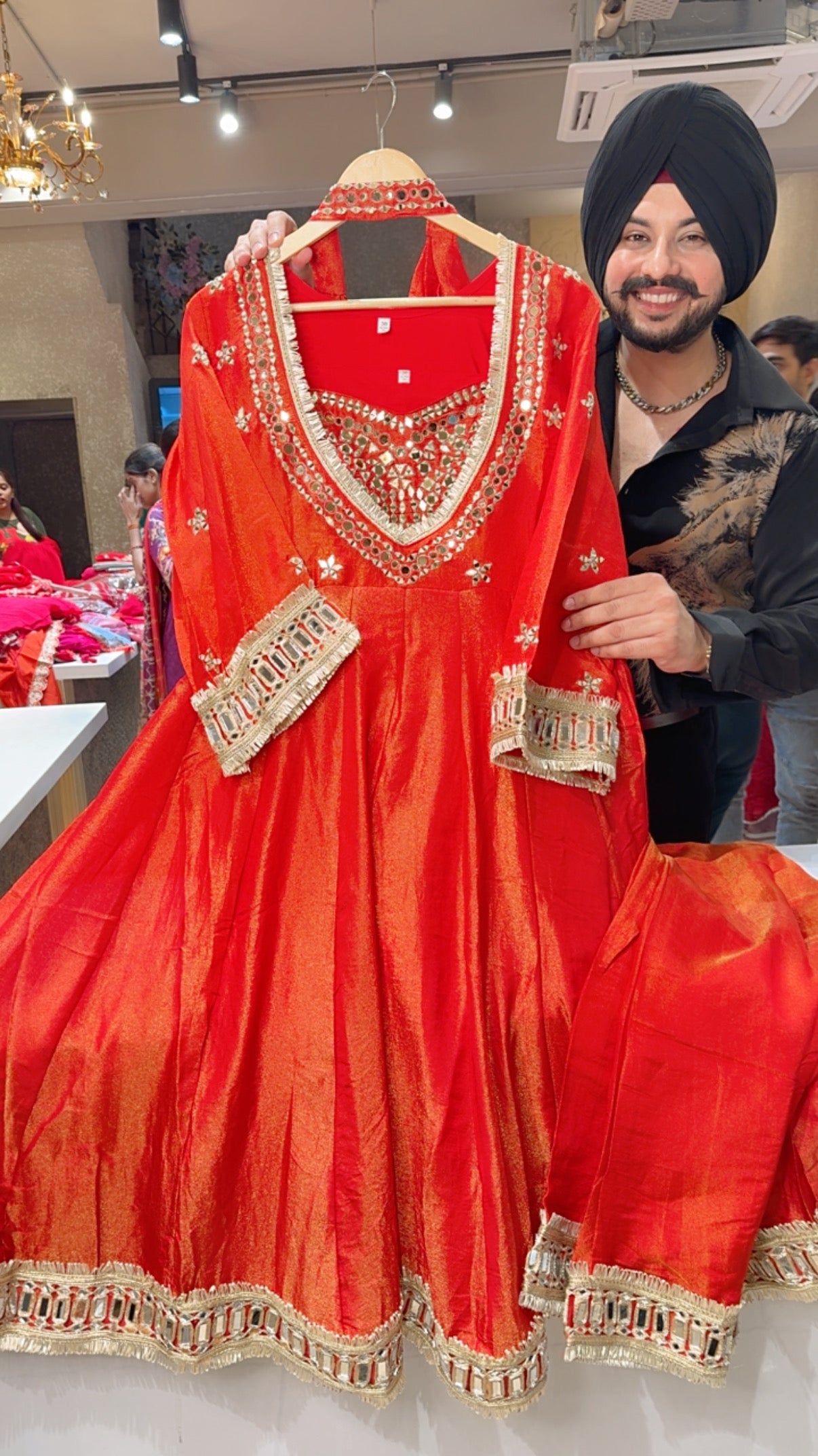 Reddish Orange Shimmer Slilk Mirror work Anarkali Suit with Heavy bustier & Necklace Duppata