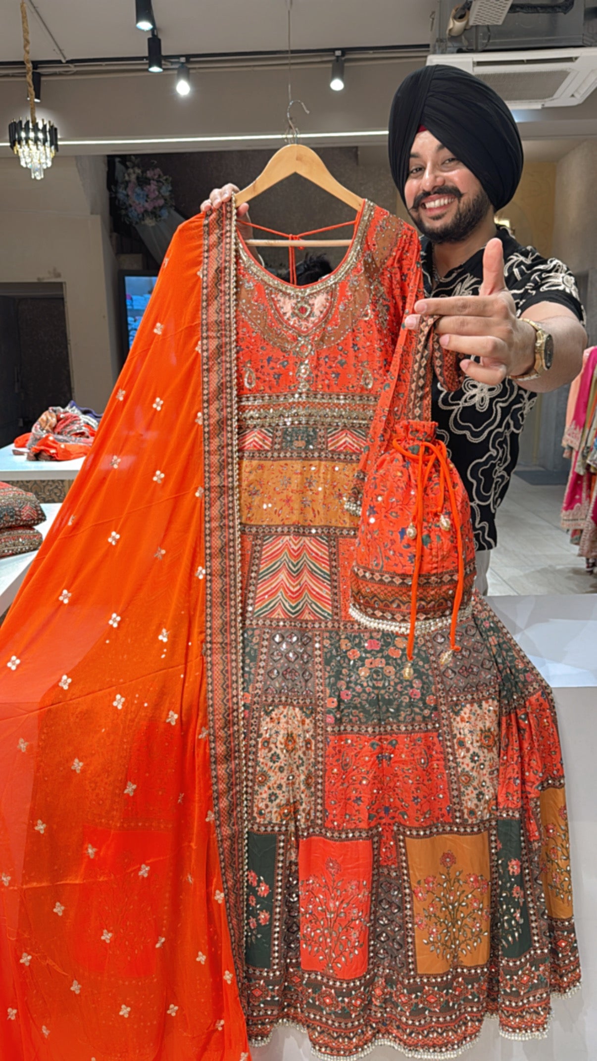 Orange Crepe Heavy Hand embroidered & Mirror Pasting Anarkali Gown with cute Potli