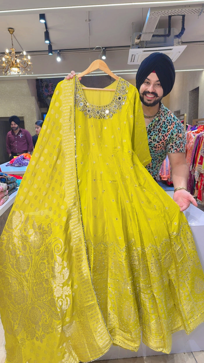 Fushia Colour Soft Silk Full Flair Hand Embroidered & Mirror Pasting Anarkali Gown With Heavy Banarasi Border & Duppata