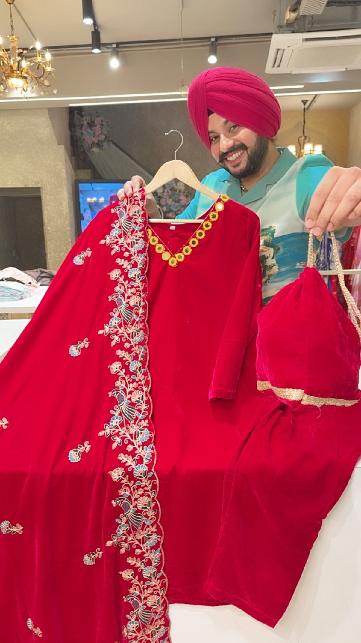 Dark Rani Velvet Party Wear Suit with Hwavy embroidered Duppata & Cute Potli