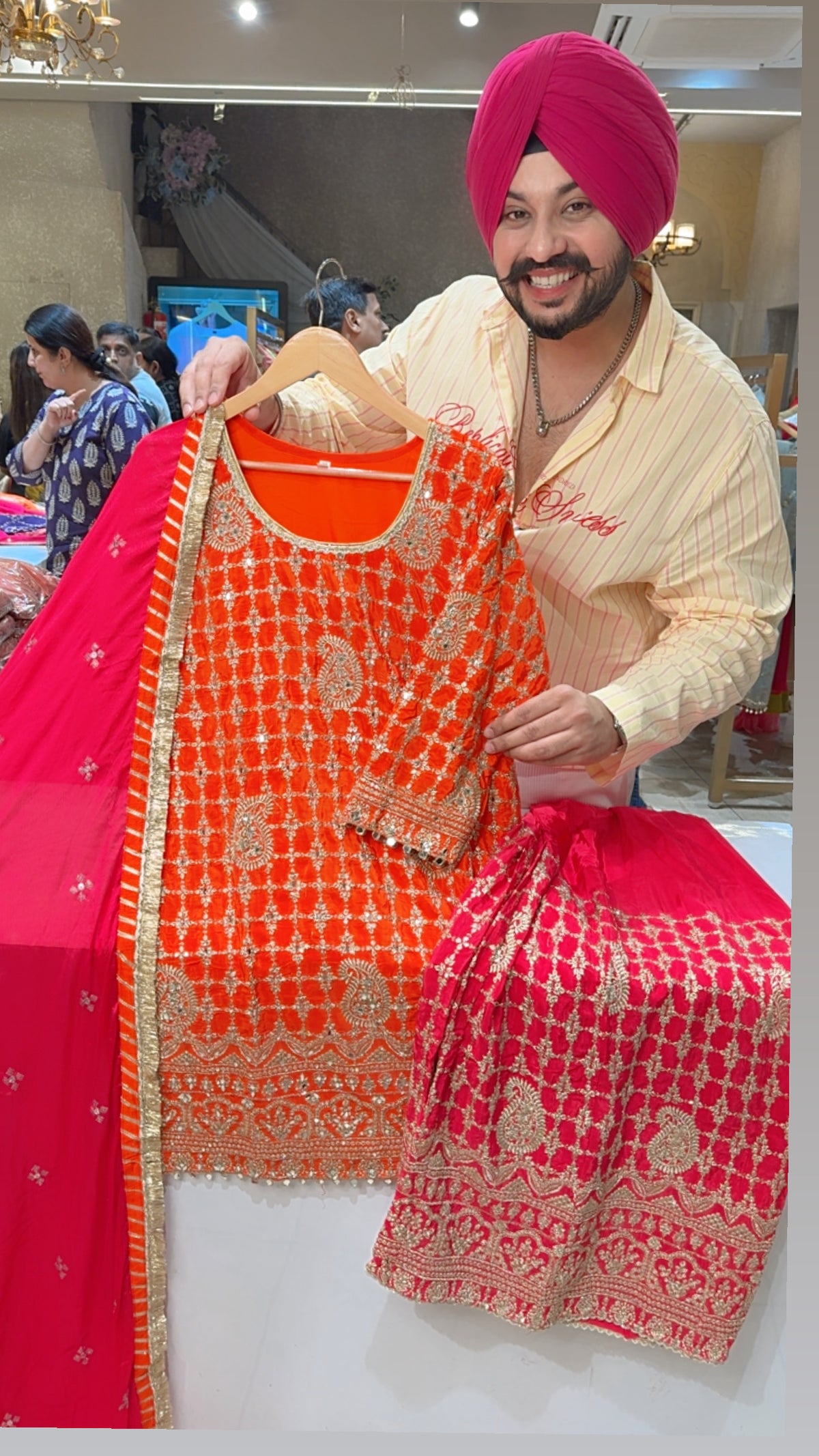 Orange & Rani Crepe Heavy Embroidery & Mirror Pasting Full Flair Sharara Suit