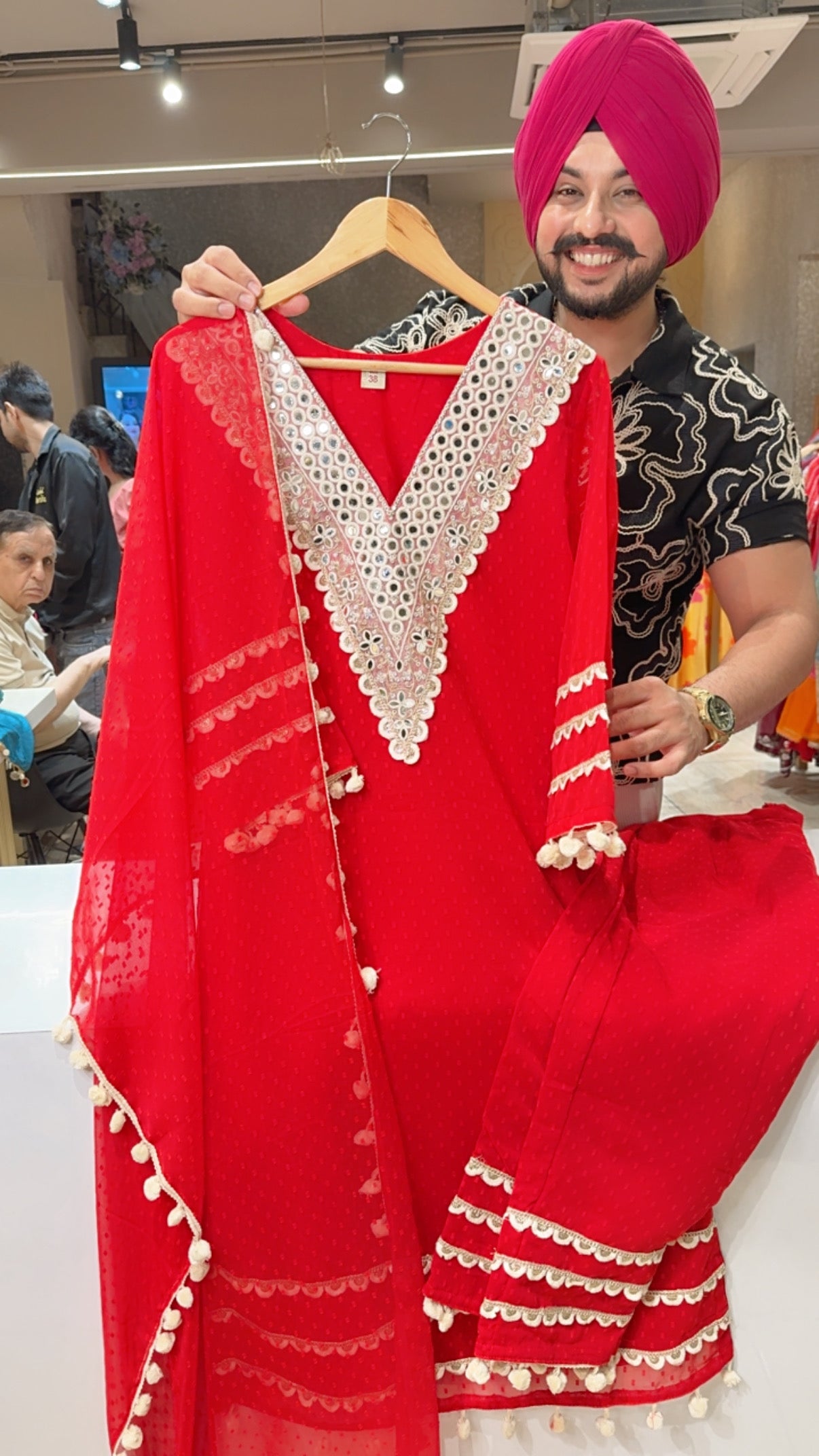 Red Georgette Party wear Pom-Pom Suit with Heavy Mirror Work on neck