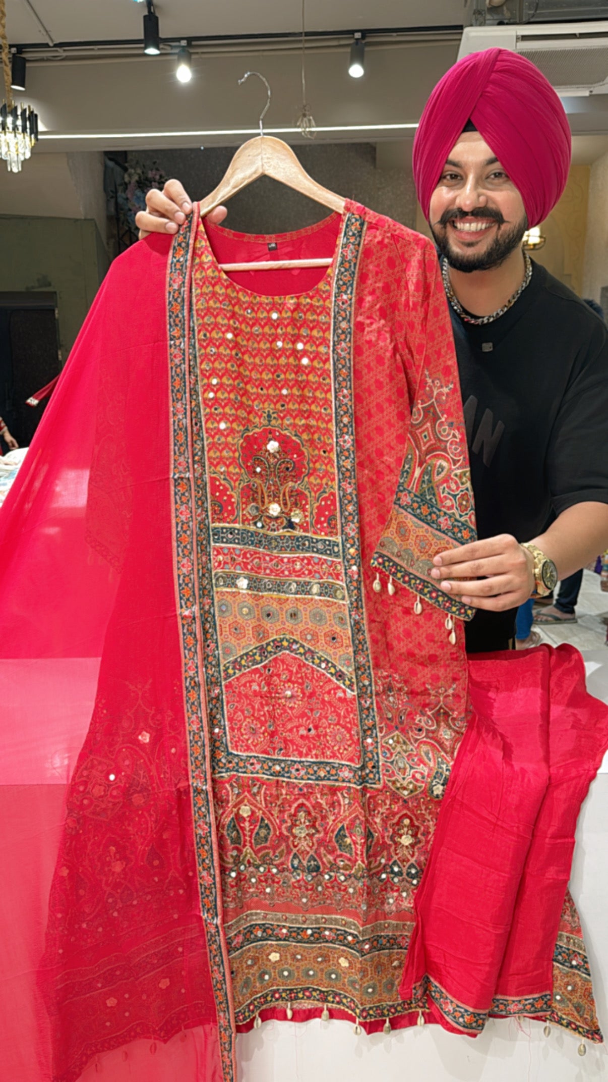 Vibrant Gajri Crepe heavy embroidered A-line Suit with Chiffon Duppata