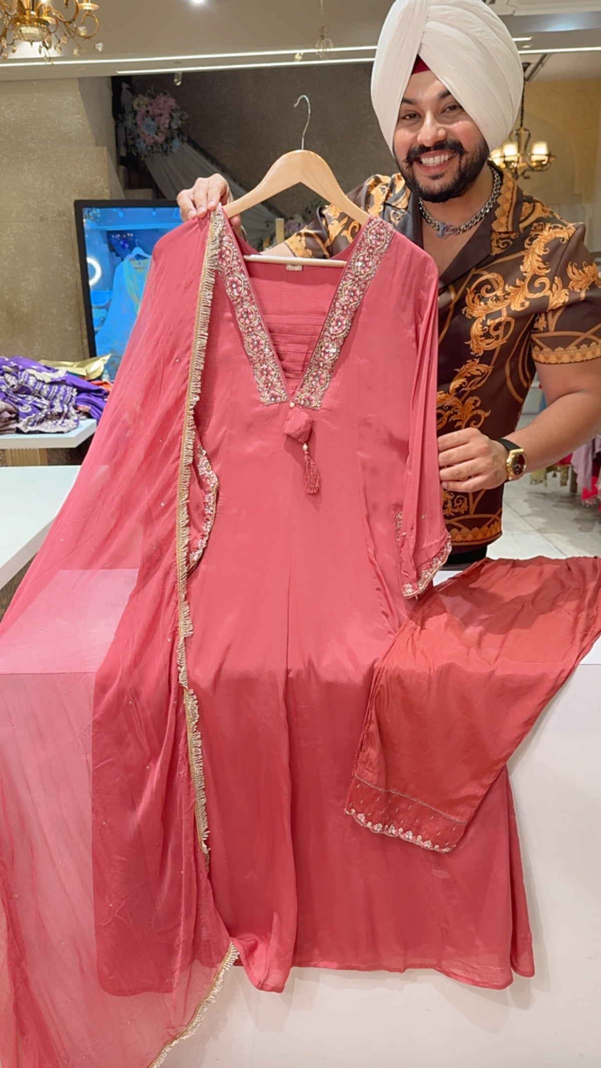 Pastel pink Chinon Party wear A-Line Suit with Hand embroidery work on Neck & Pockets