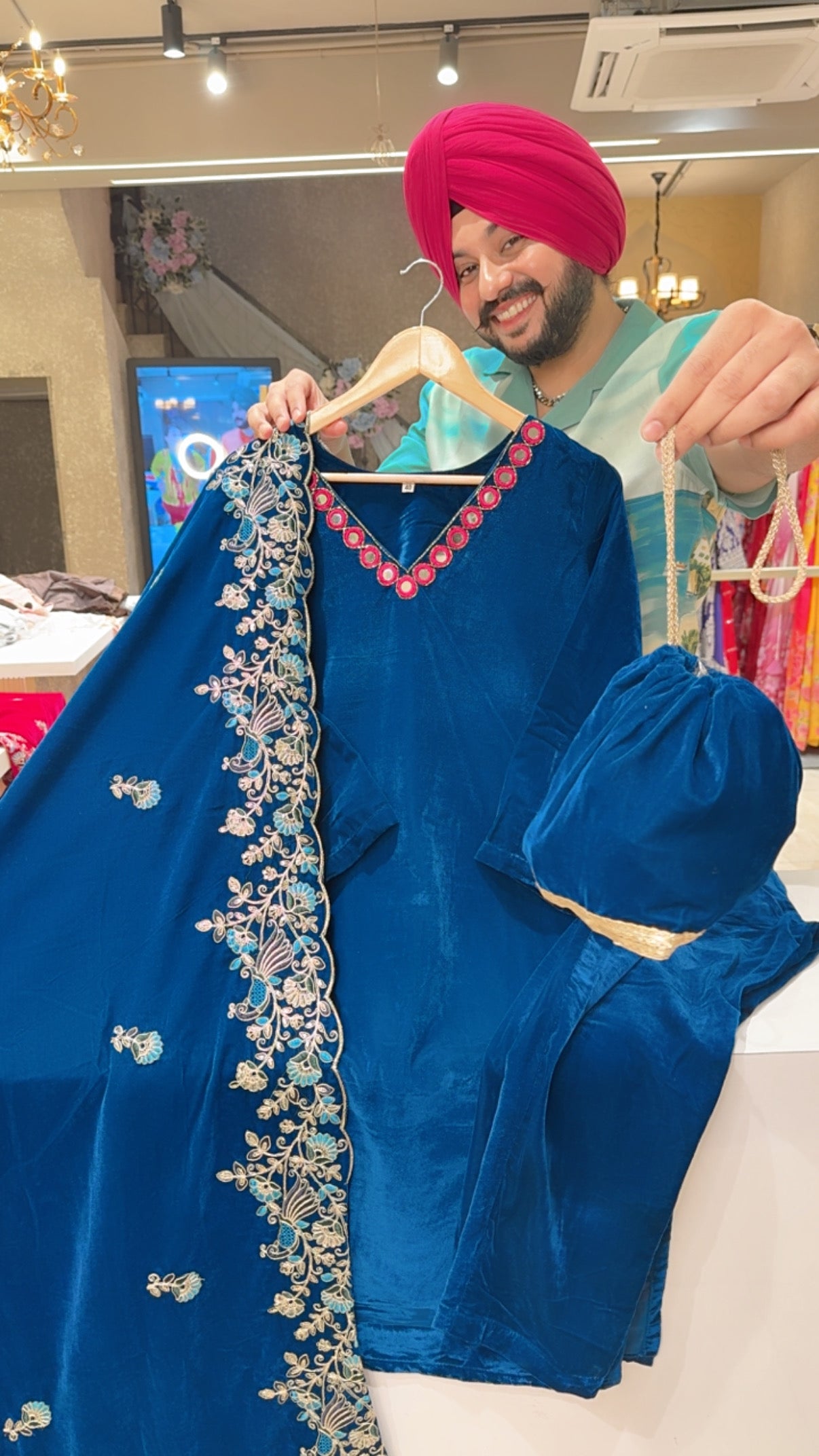 Teel Blue Velvet Party Wear Suit with Hwavy embroidered Duppata & Cute Potli