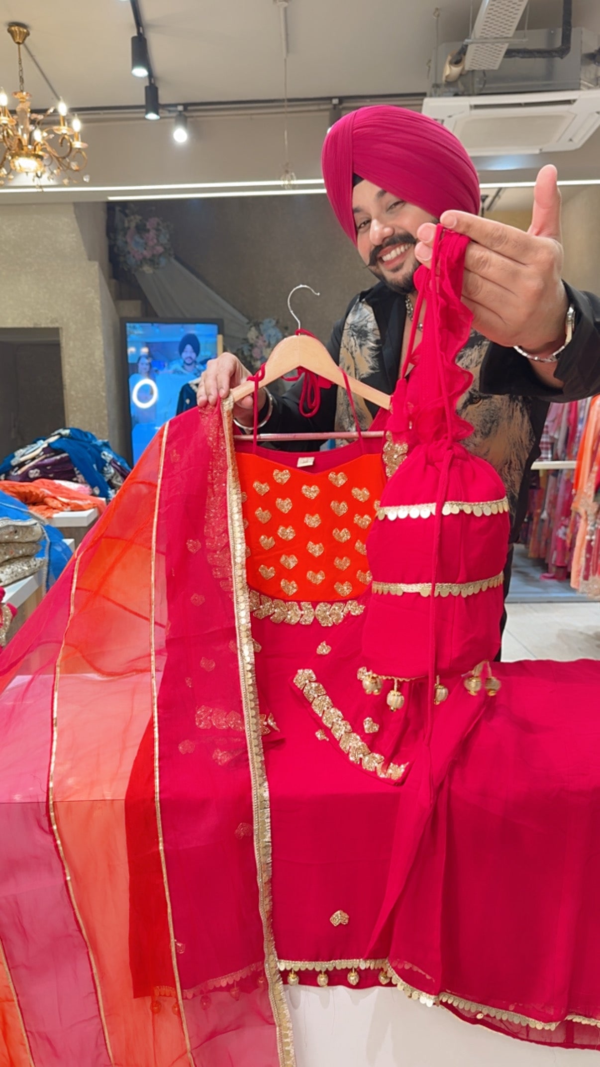 Rani pink Georgette Heavy Hand embroidered Party wear Sharara Suit with organza Duppata & Cute Potli