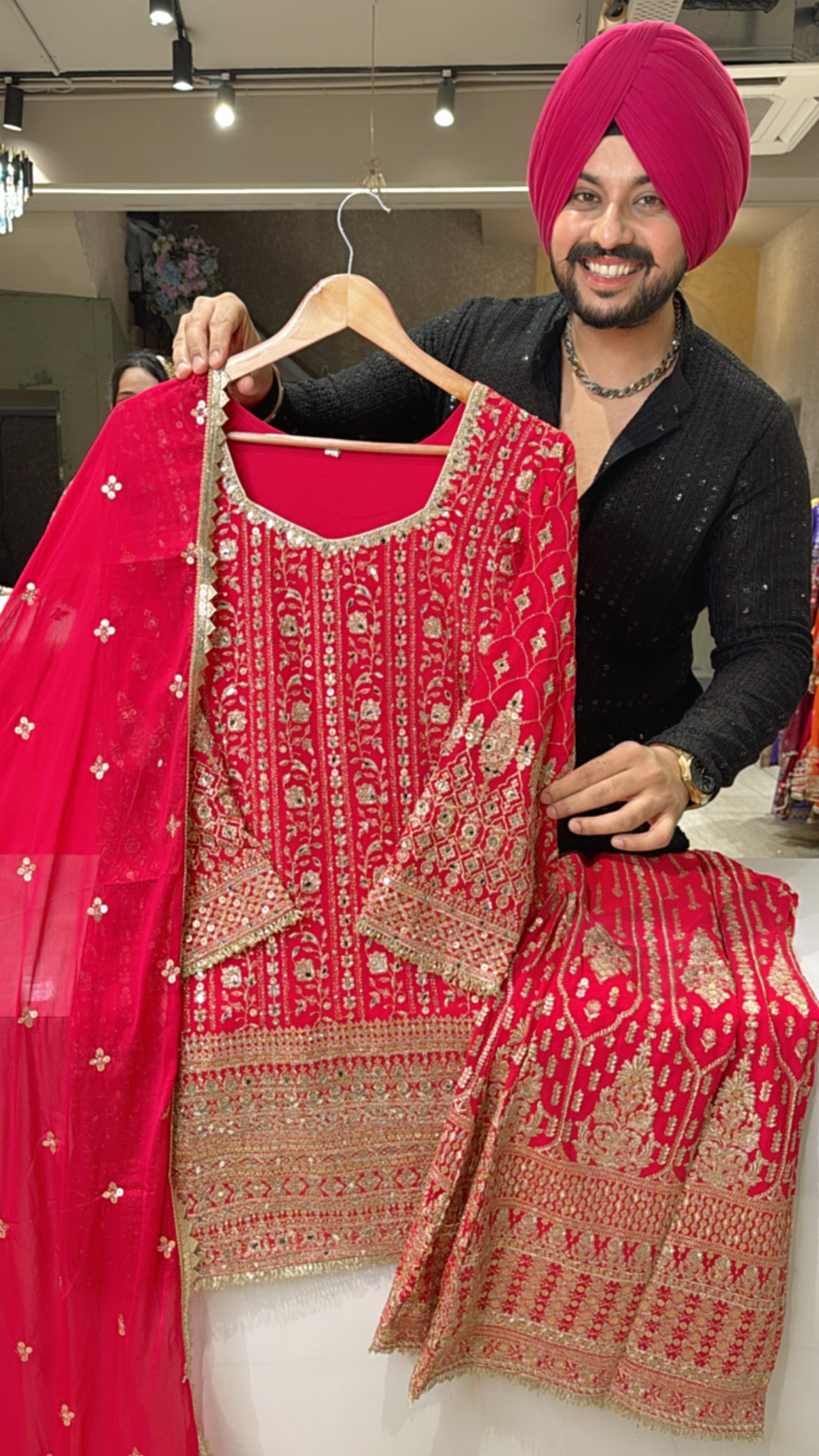Rani Pink karwachauth Special Georgette Fully Heavy embroidered Bell Bottom Suit