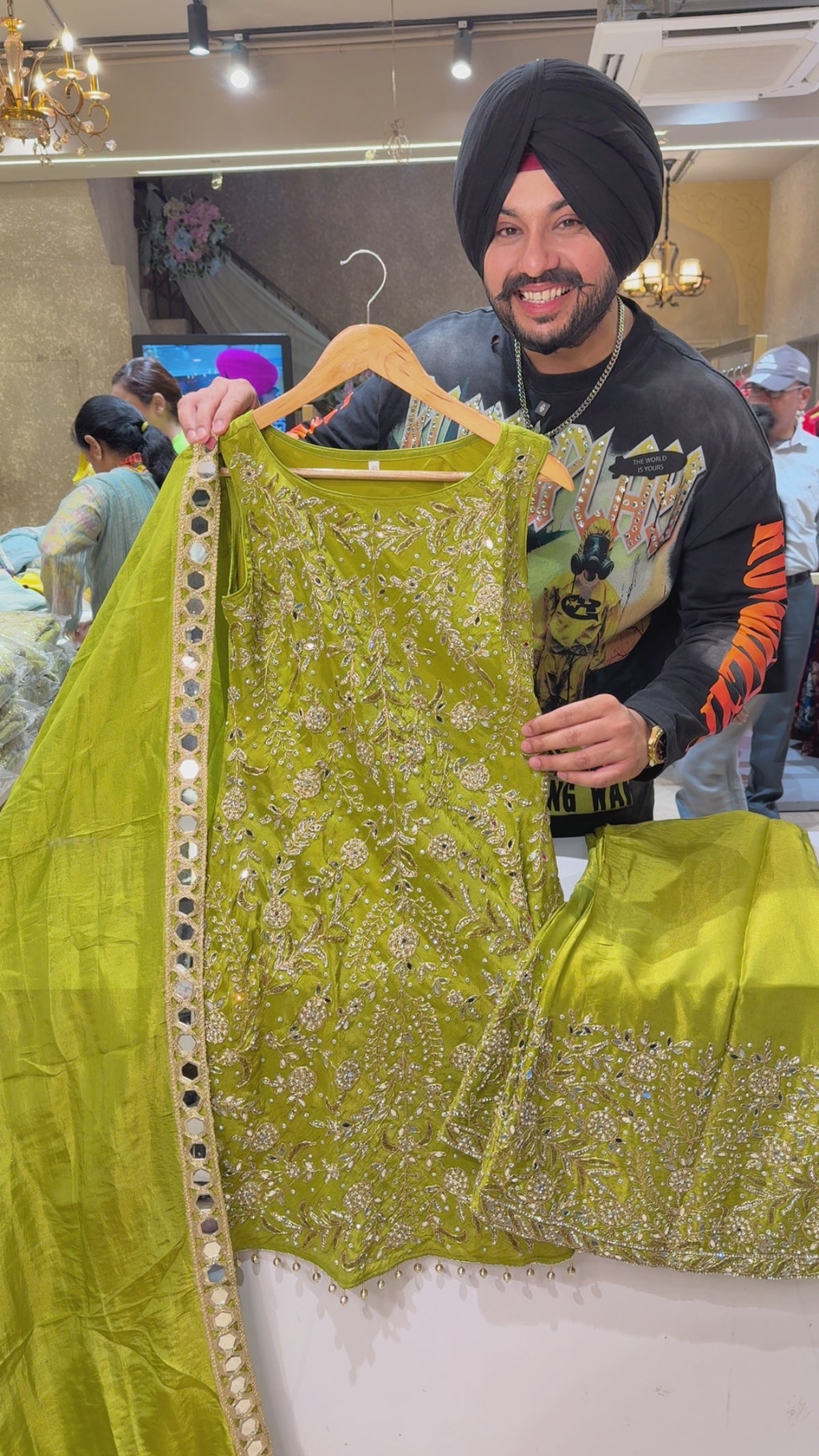 Mehendi Green Shimmer Silk Fully Hand embroidered & Mirror Pasting Boat Neck Paplum Bell Bottom Heavy Suit