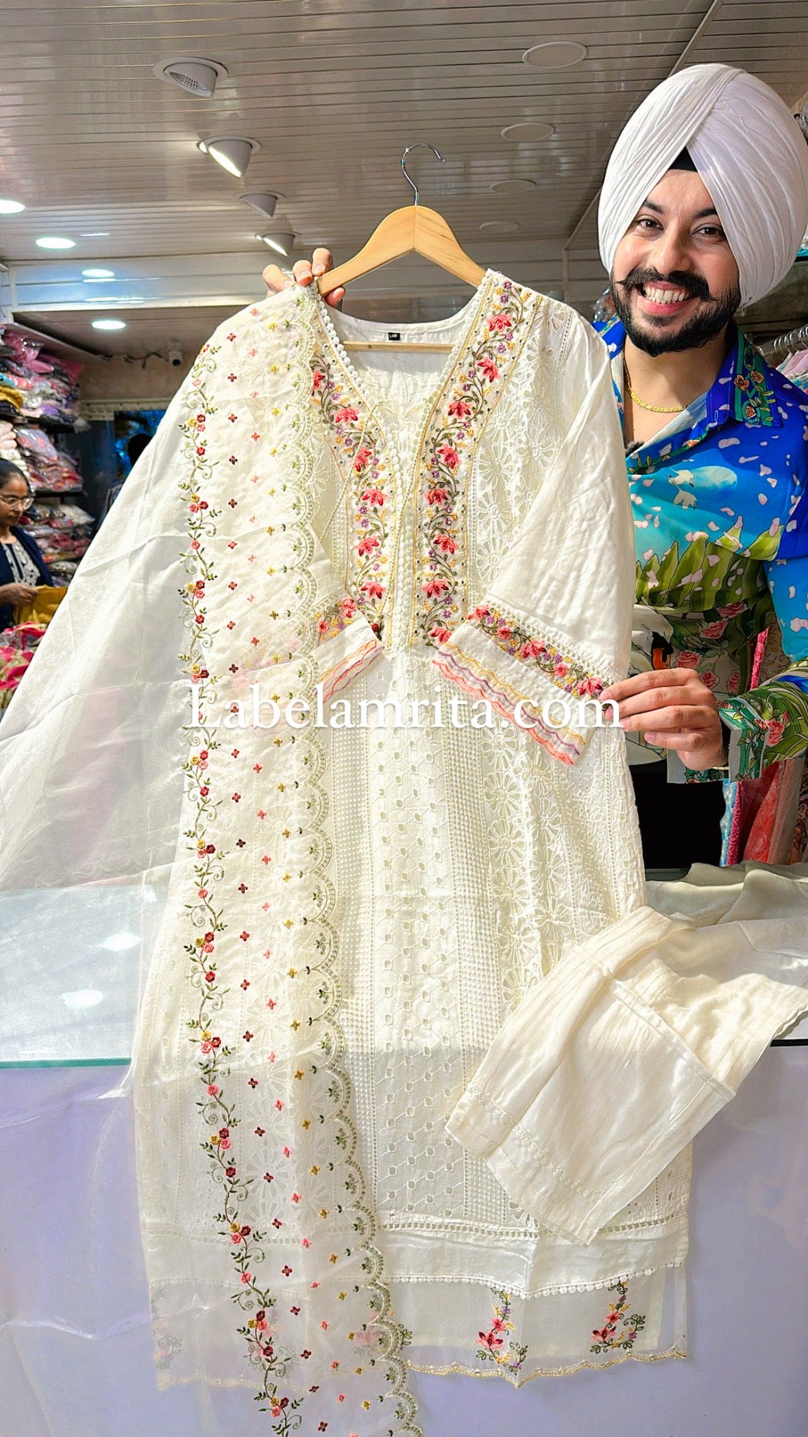 Off white Muslin silk Embroidered Pakistani suit with Beautiful Organza Duppata