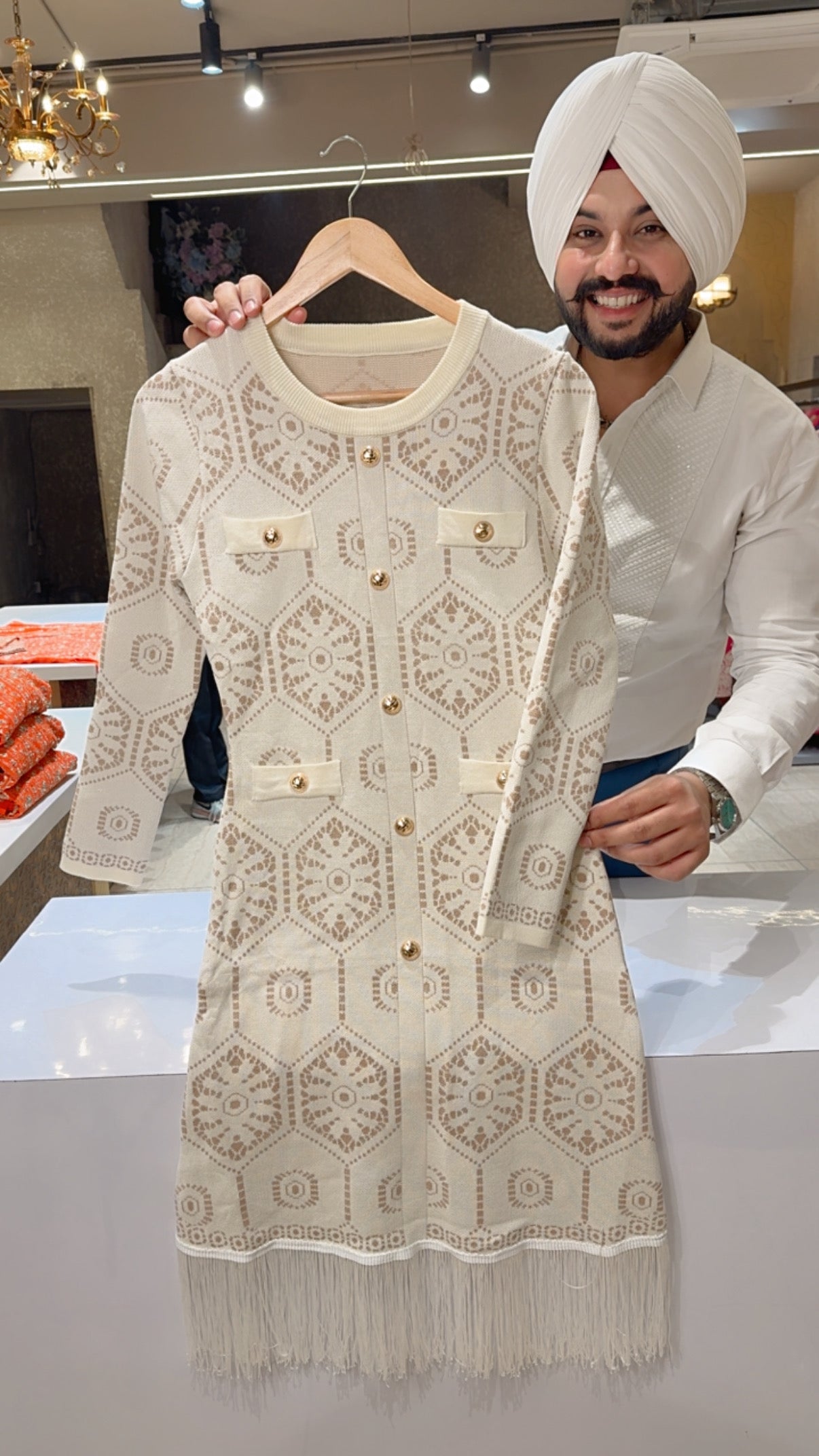 Off white Nitting Woolen Knee length Girlish Dress with Frill on Border