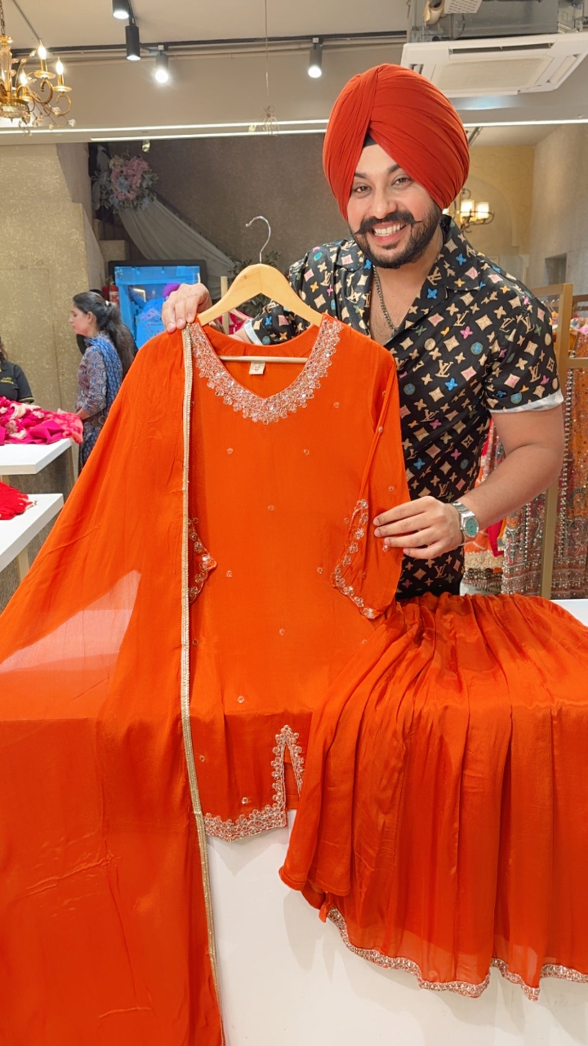 Orange Chinon Front Slit Hand Embroidered Full Flair Sharara Set With Sleek Chiffon Duppata