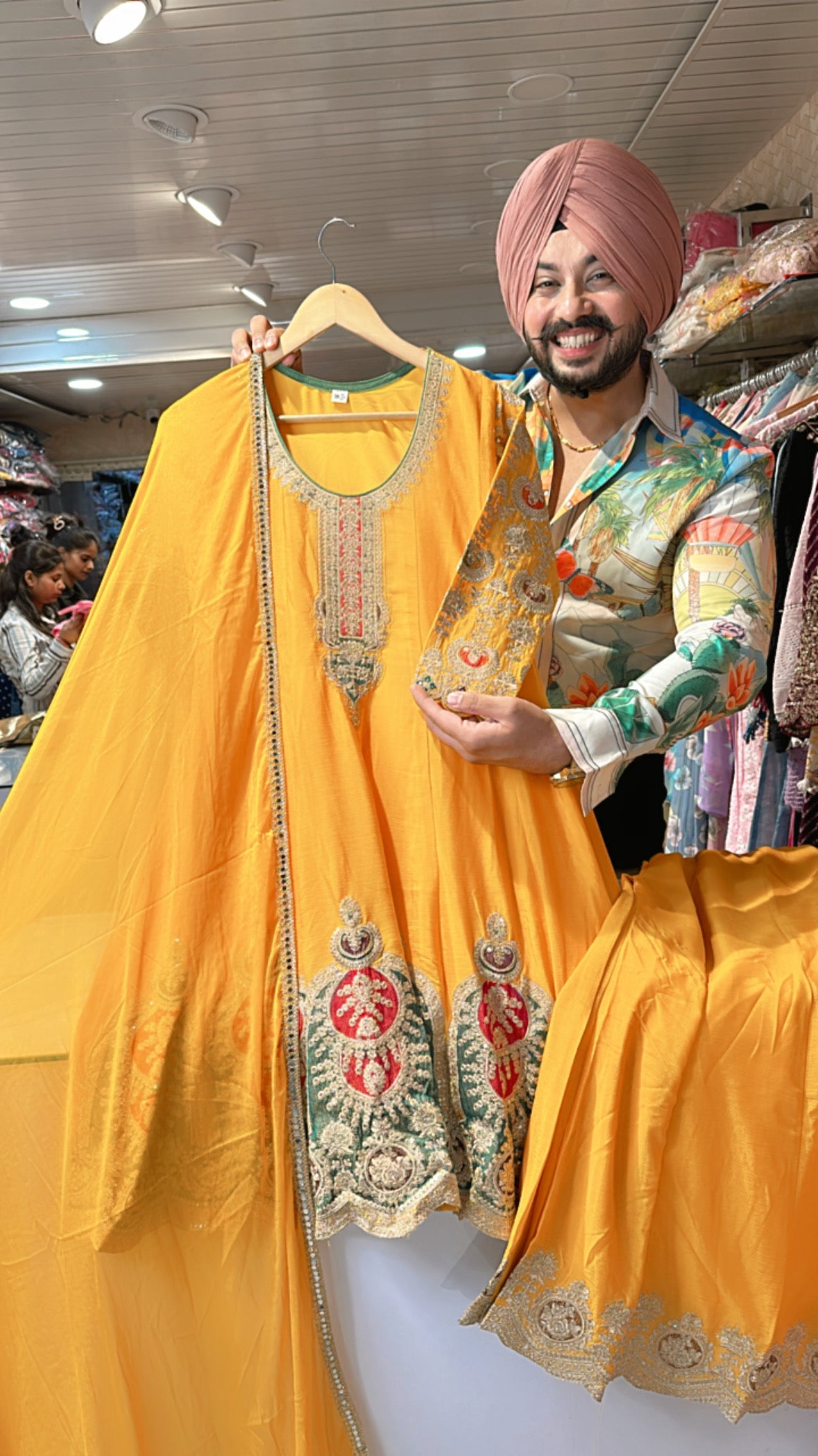 Yellow chinon Paplum Sharara suit with Heavy embroidery work