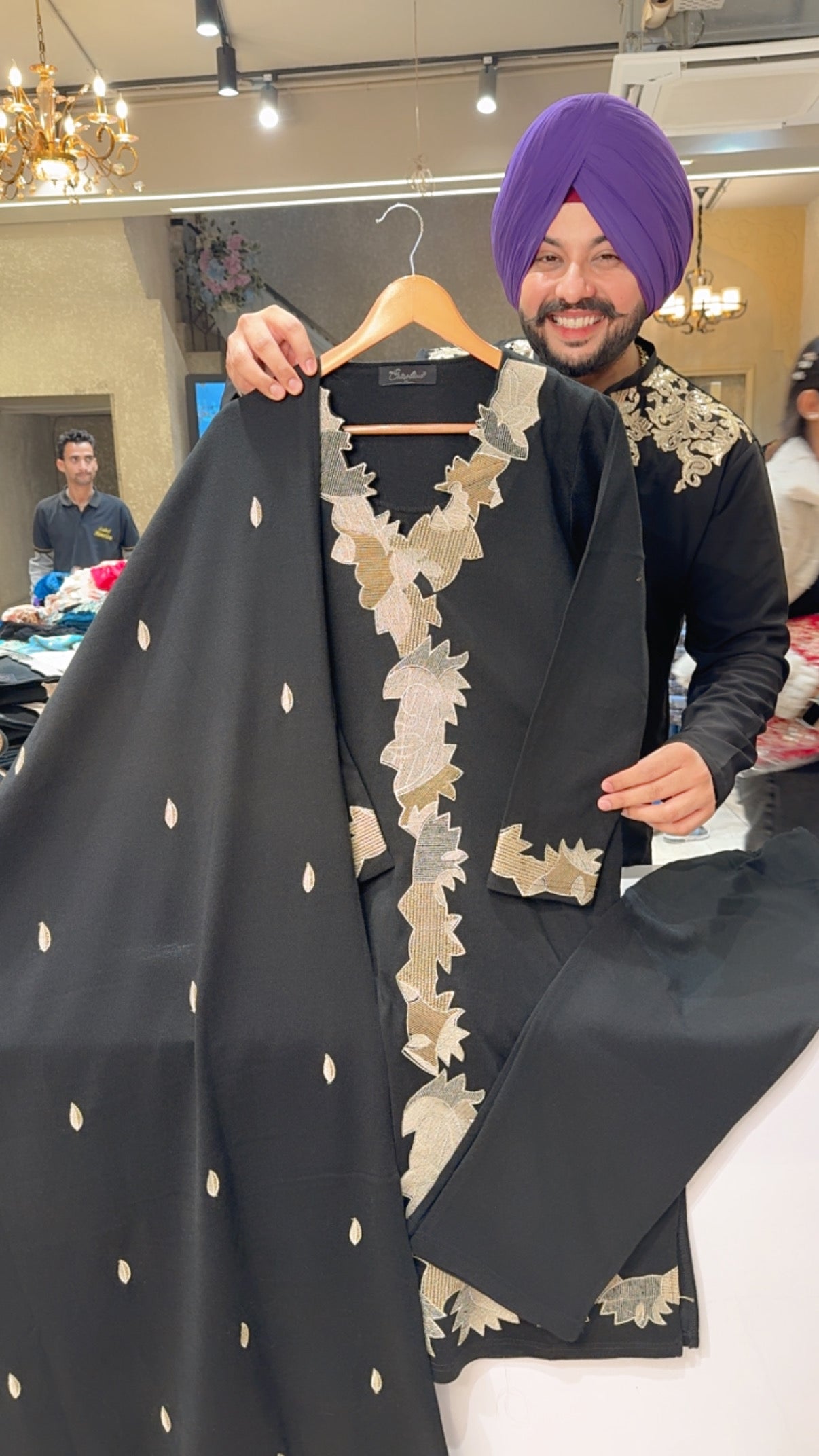 Black Woolen Designer neck Straight Suit with Beautiful Embroidery work On It