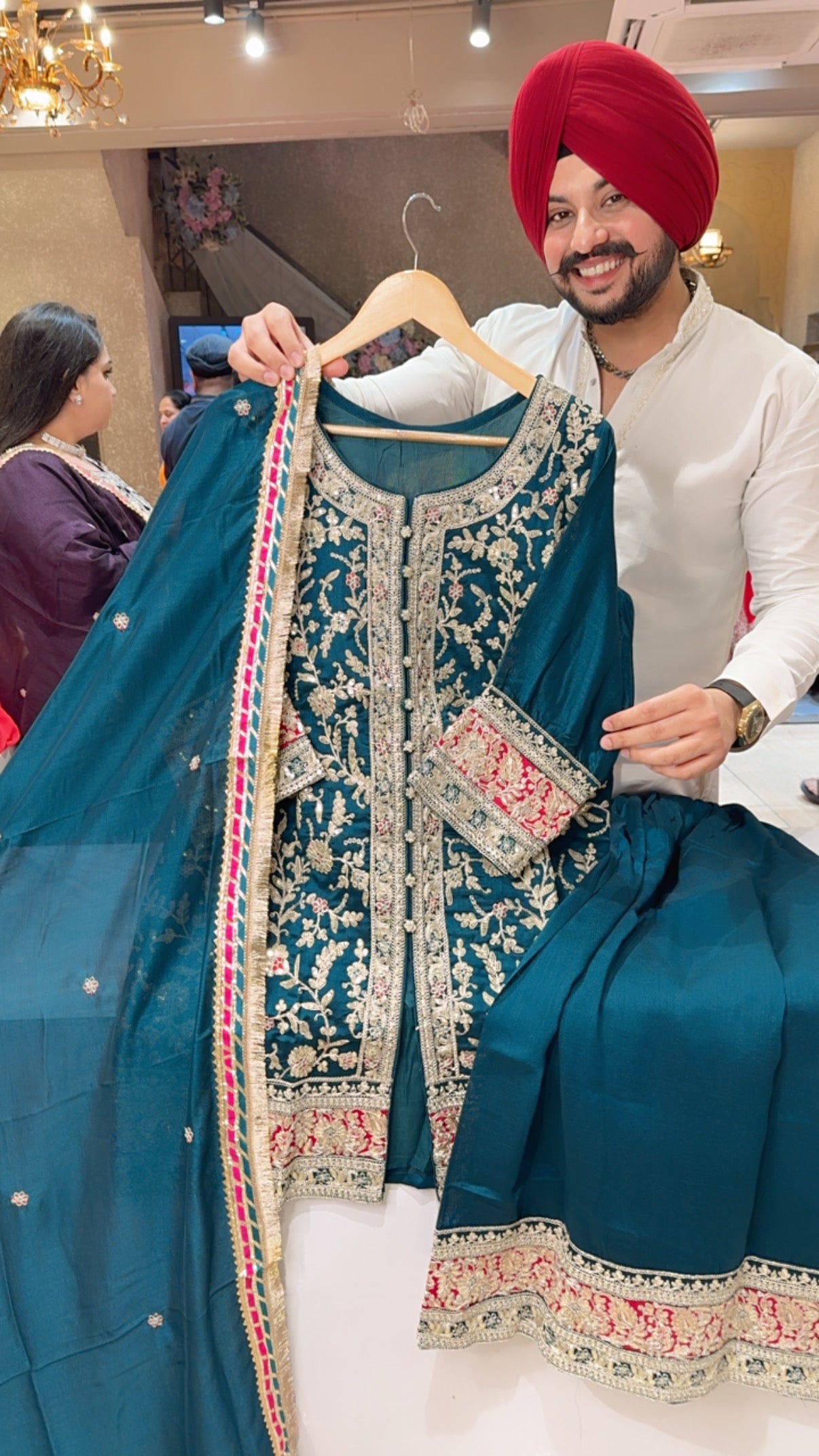Peacock Heavy Embroidered Full Flair Plazo suit with Beautiful Duppata