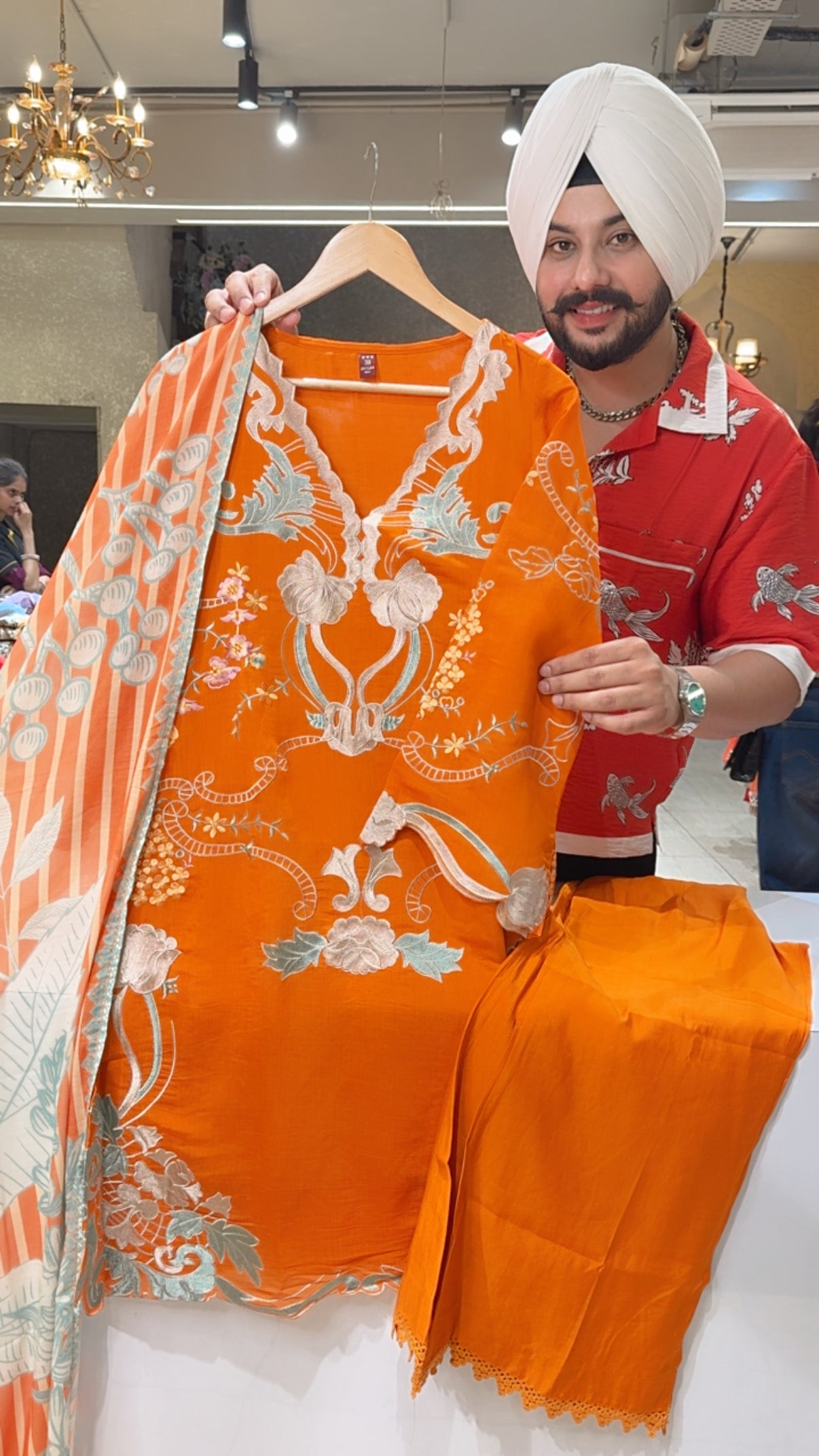 Orange Mal Chanderi Fully Floral Embroidered Kashmiri Suit with Soft Leaf Print Duppata