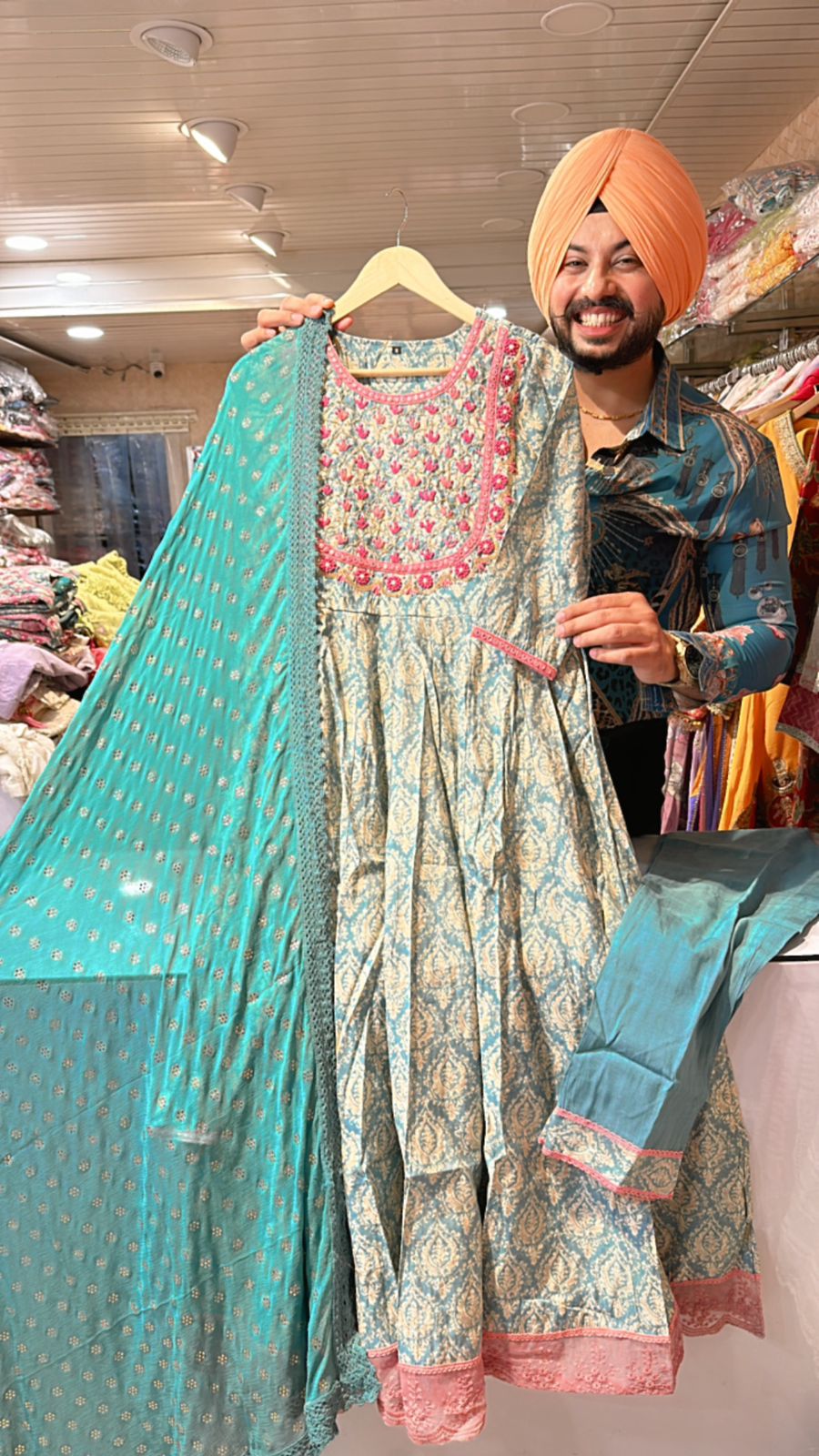 Light blue Muslin silk Full Flair Anarkali suit with Hand embroidery Work on neck